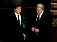 Actors Charlie Sheen and Martin Sheen present an award at the 58th Annual Primetime Emmy Awards at the Shrine Auditorium on August 27, 2006 (Photo by Vince Bucci/Getty Images)